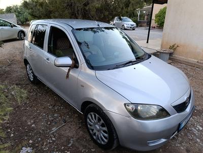 Mazda Demio — 4
