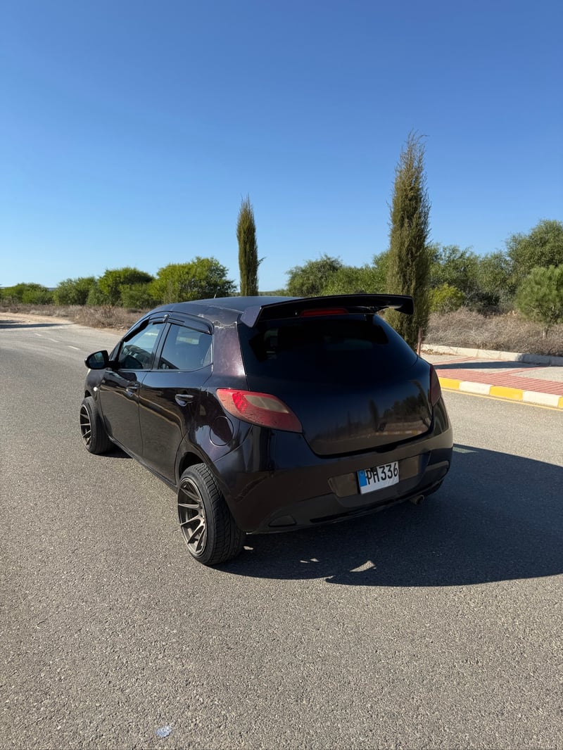 Mazda Demio — 3