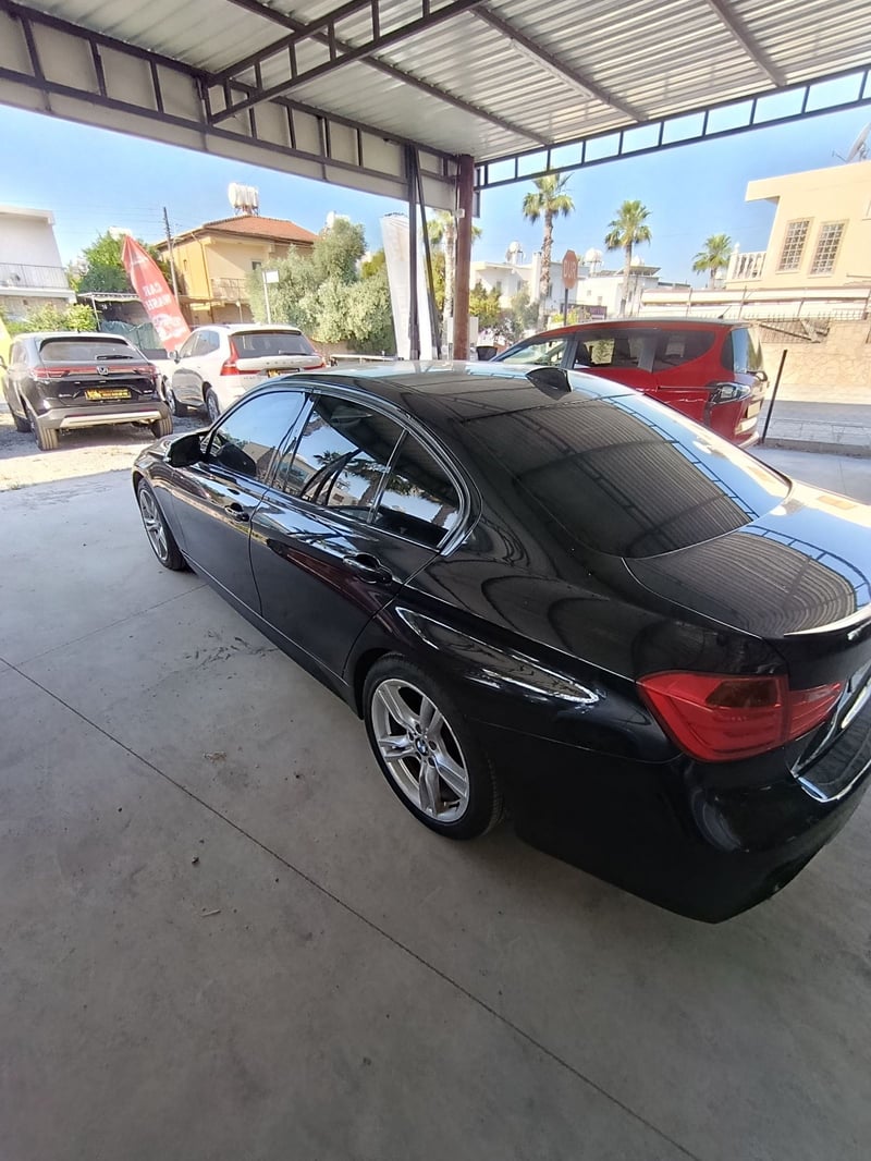 BMW 320i — 2