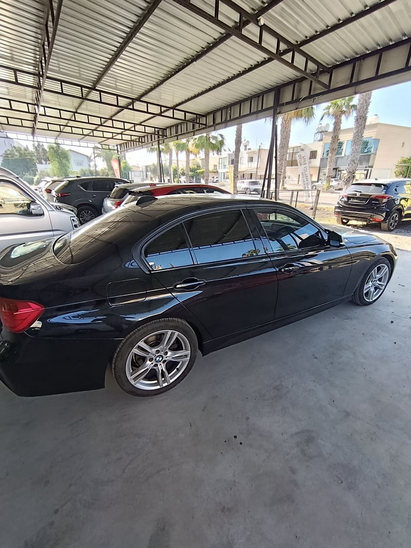 BMW 320i — 3