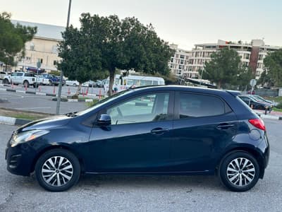 Mazda Demio — 4
