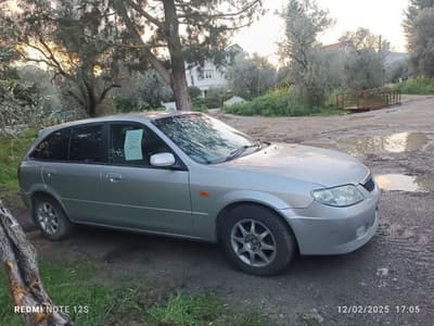 Mazda Familia — 3