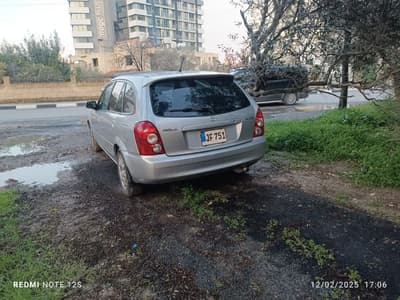 Mazda Familia — 4