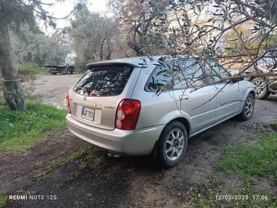Mazda Familia — 5