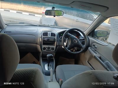 Mazda Familia — 6