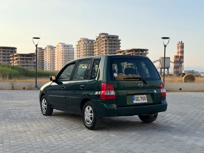 Mazda Demio — 4