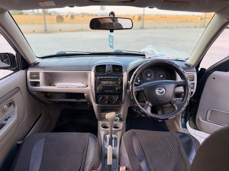 Mazda Demio — 7