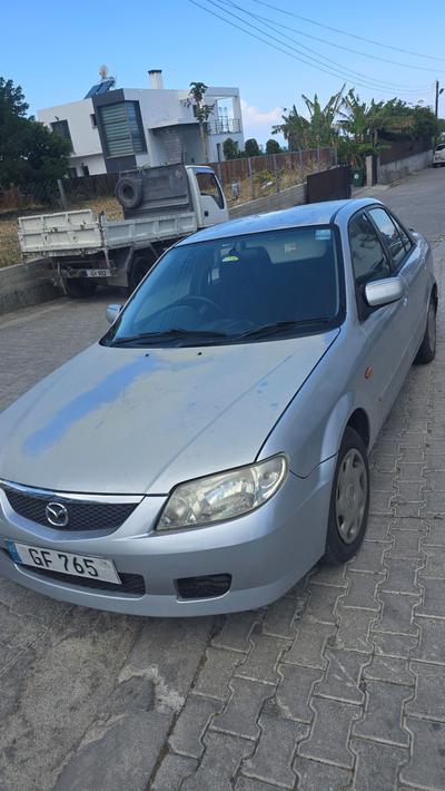 Mazda Familia — 4