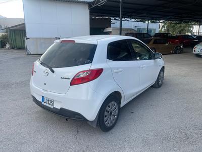 Mazda Demio — 4
