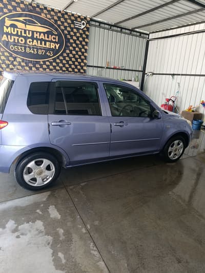 Mazda Demio — 3
