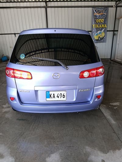 Mazda Demio — 4