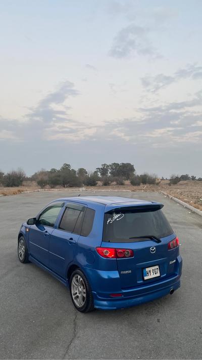 Mazda Demio — 6
