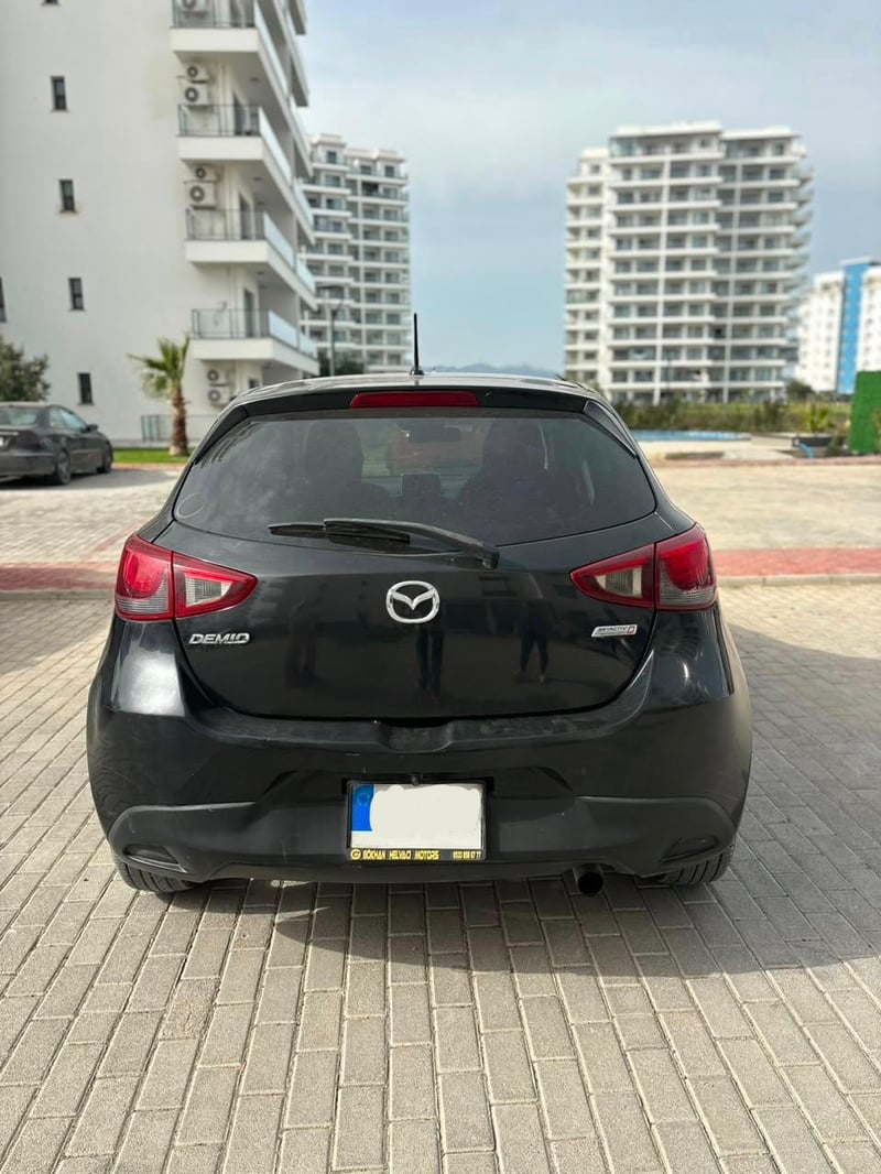 Mazda Demio — 3