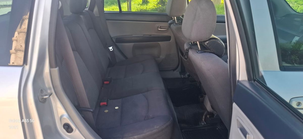2004 Mazda Demio 7