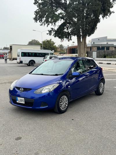 Mazda Demio  — 3