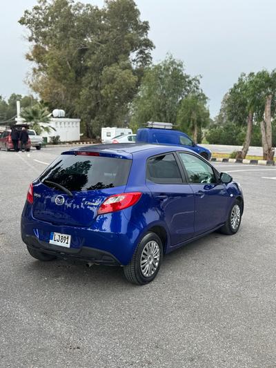 Mazda Demio  — 6