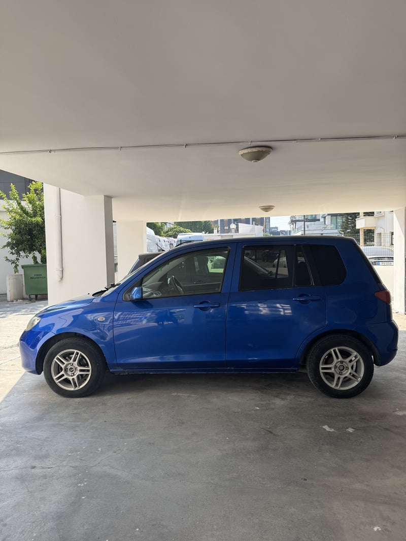 Mazda Demio — 1