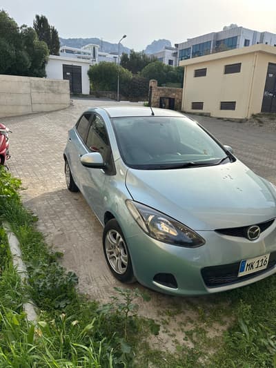 Mazda Demio — 4