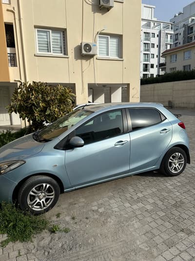 Mazda Demio — 6