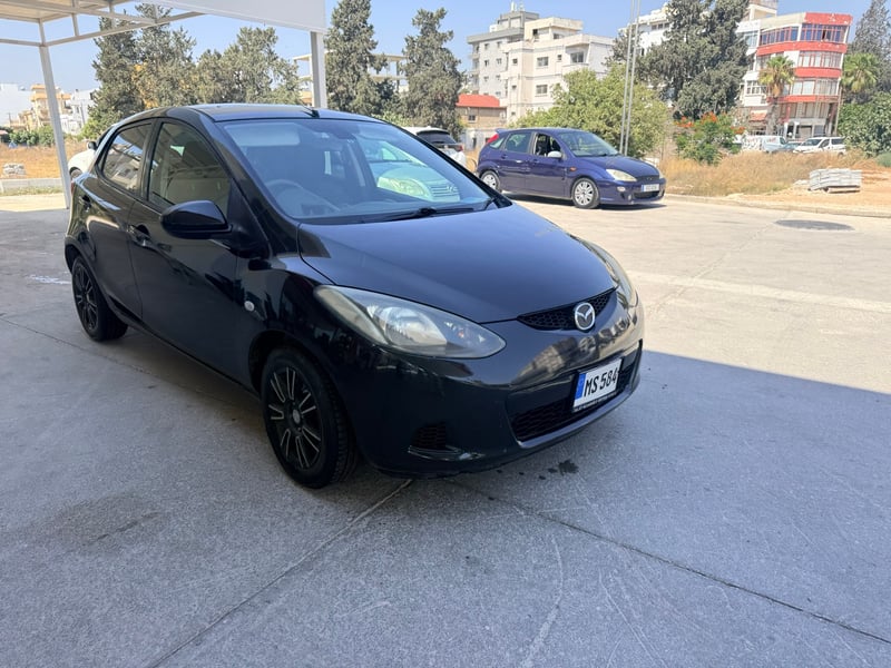 Mazda Demio — 3