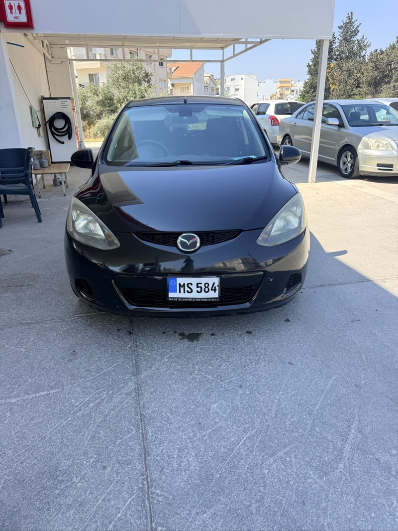 Mazda Demio — 4