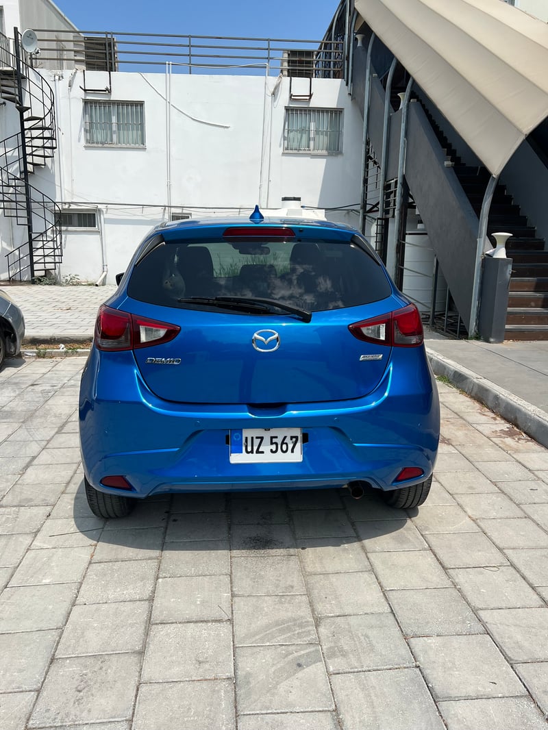 Mazda Demio — 4