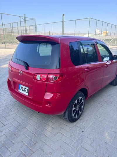 Mazda Demio — 6