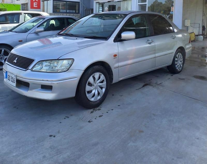 Mitsubishi Lancer — 1/4