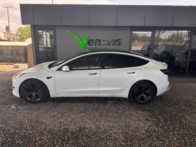Tesla Model 3 — 3