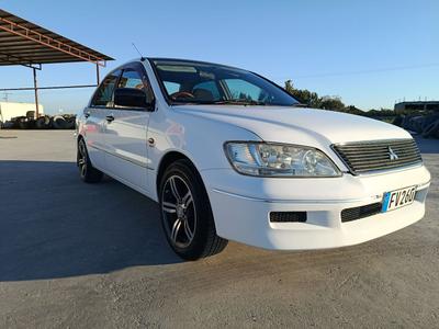 Mitsubishi Lancer — 6