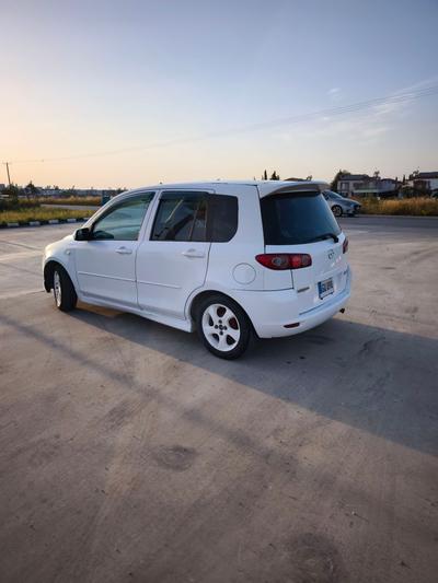 Mazda Demio — 4