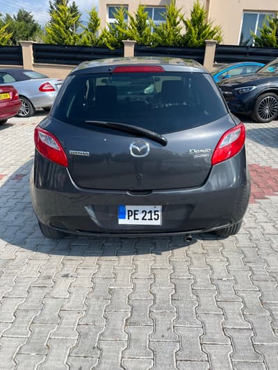 Mazda Demio — 4