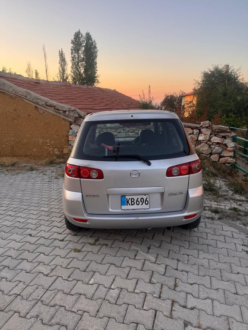 Mazda Demio — 3