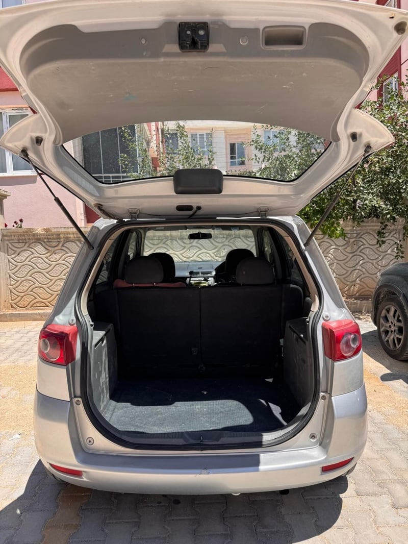 Mazda Demio — 6
