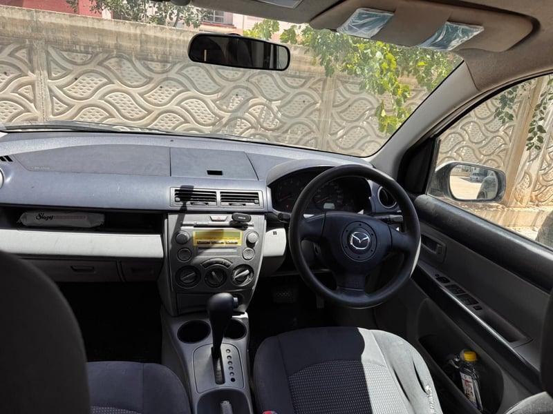 Mazda Demio — 7