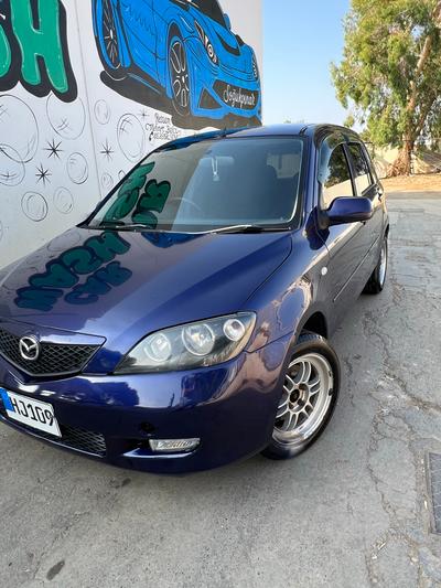 Mazda Demio — 1