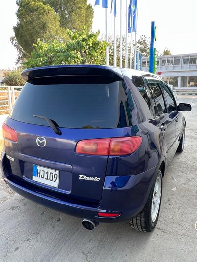 Mazda Demio — 4