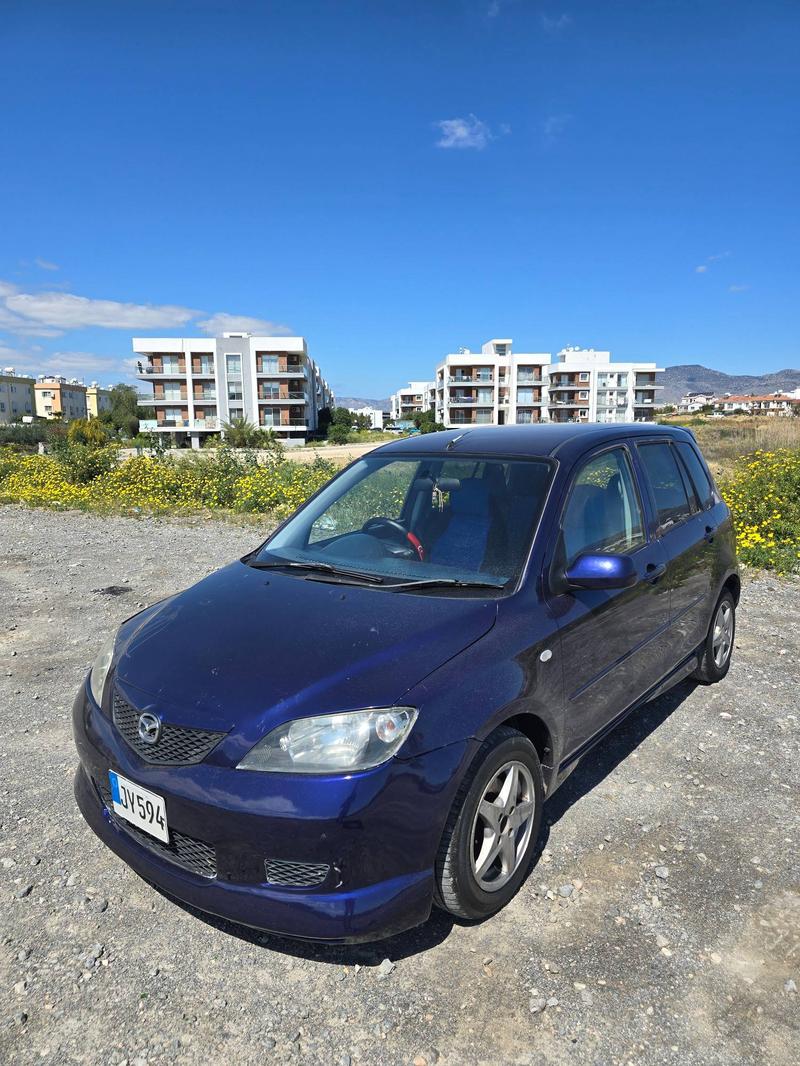 Mazda Demio — 1/8
