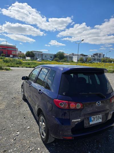 Mazda Demio — 4