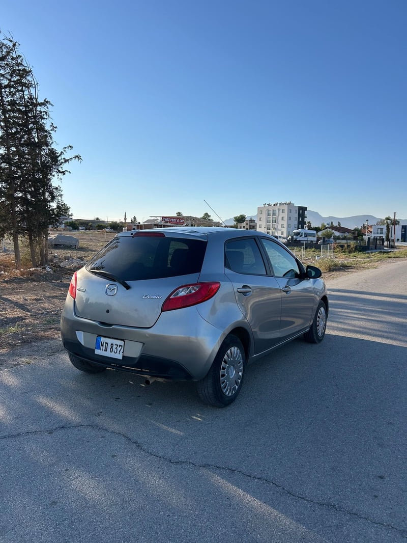Mazda Demio — 6
