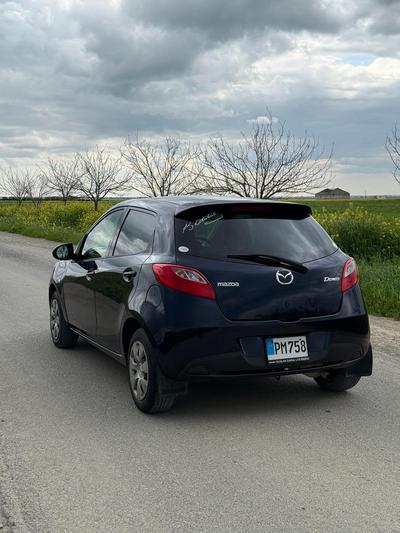 Mazda Demio — 3