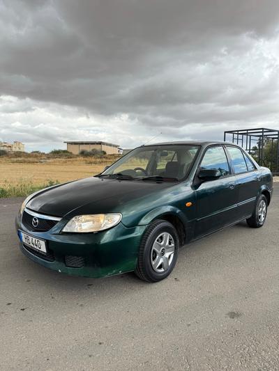 Mazda Familia — 4