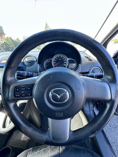 Mazda Demio — 4
