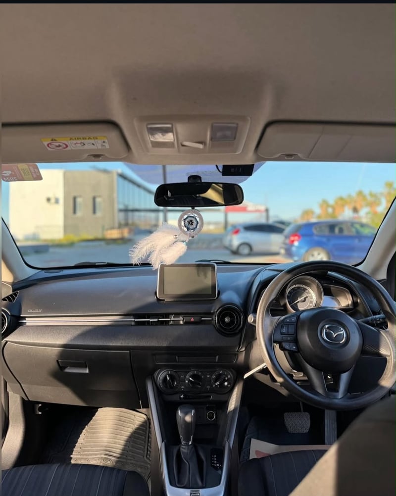 Mazda Demio — 4