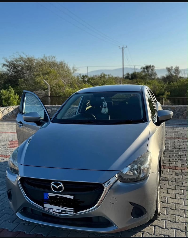Mazda Demio — 6