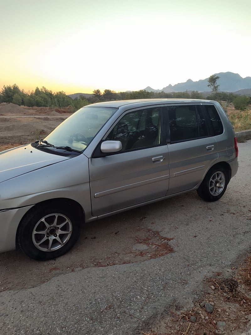 Mazda Demio — 3