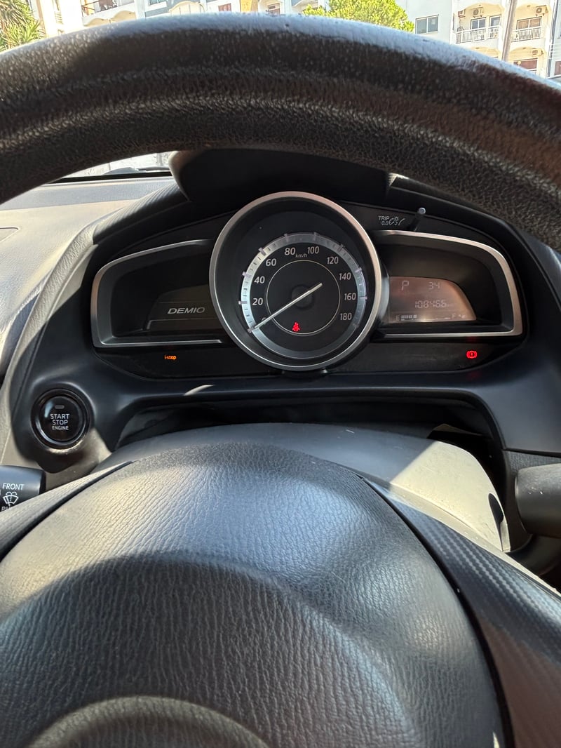 Mazda Demio — 4