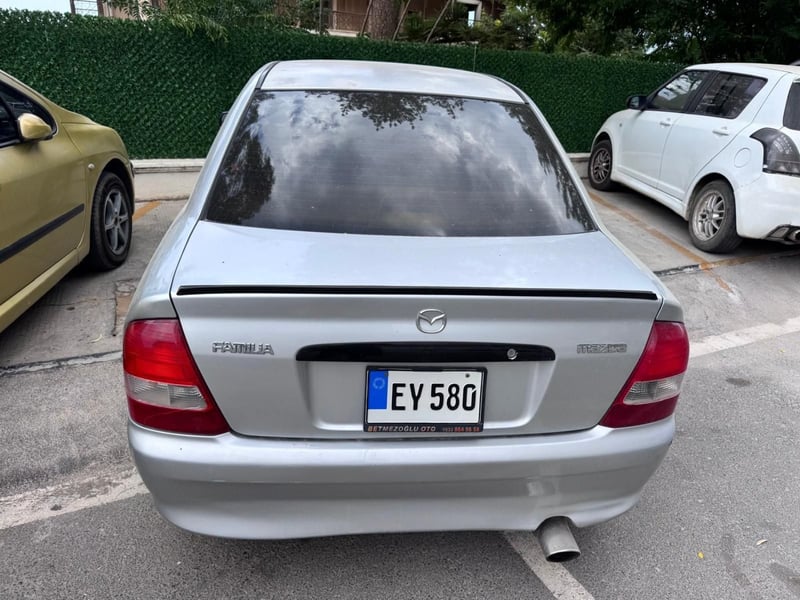 Mazda Familia — 3