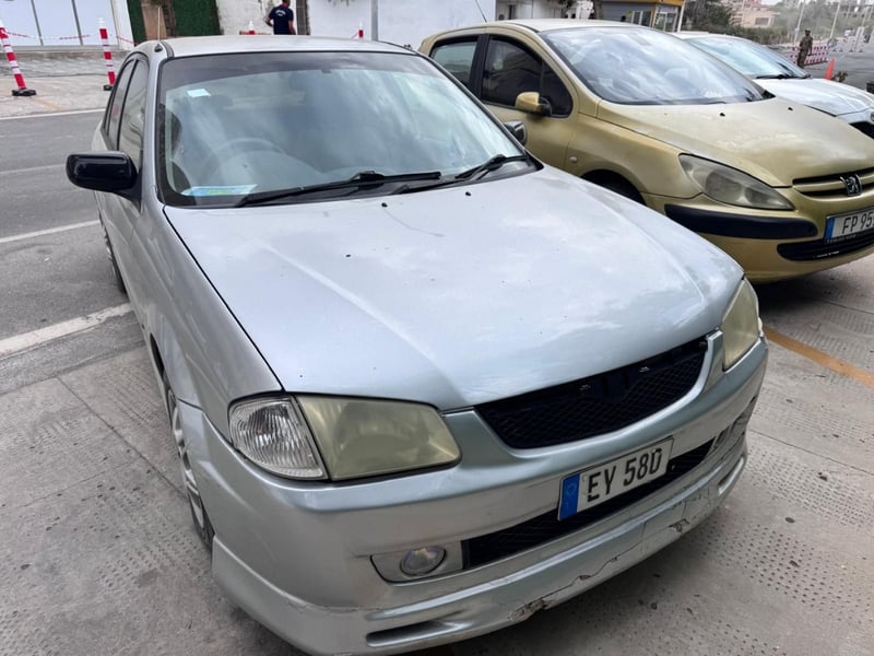 Mazda Familia — 4