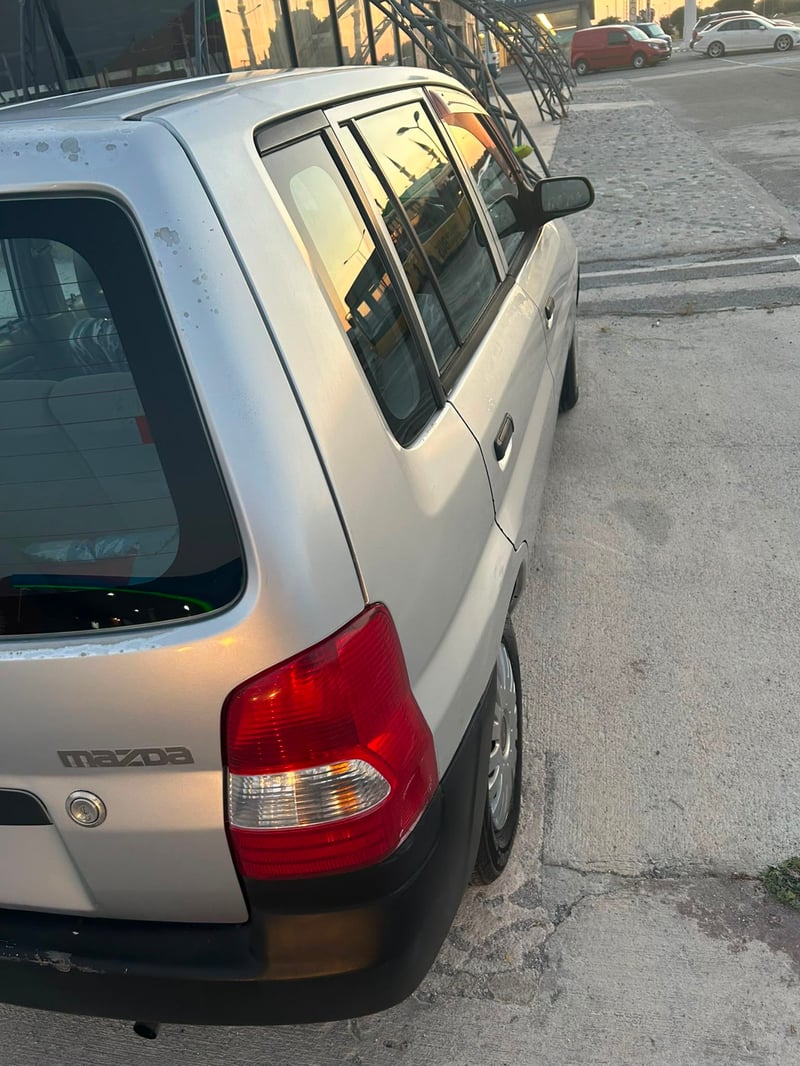 Mazda Demio — 6